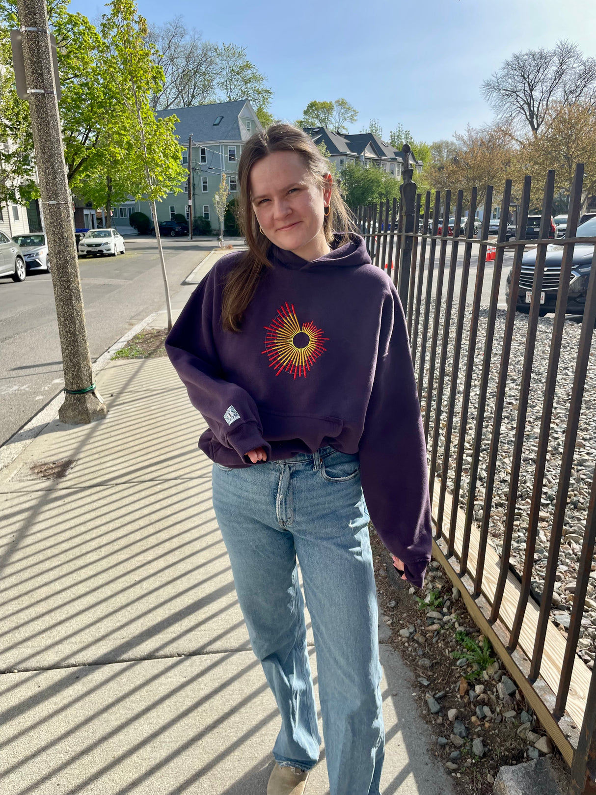 Anna wearing the surge custom sweatshirt