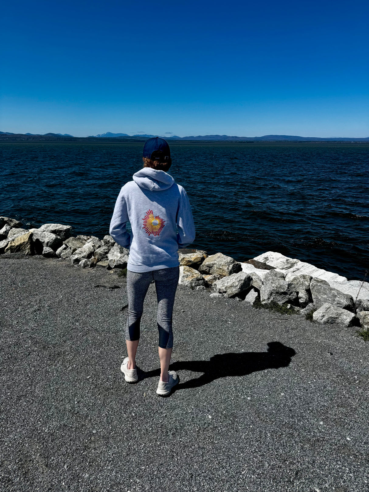 Anna wearing the surge custom sweatshirt