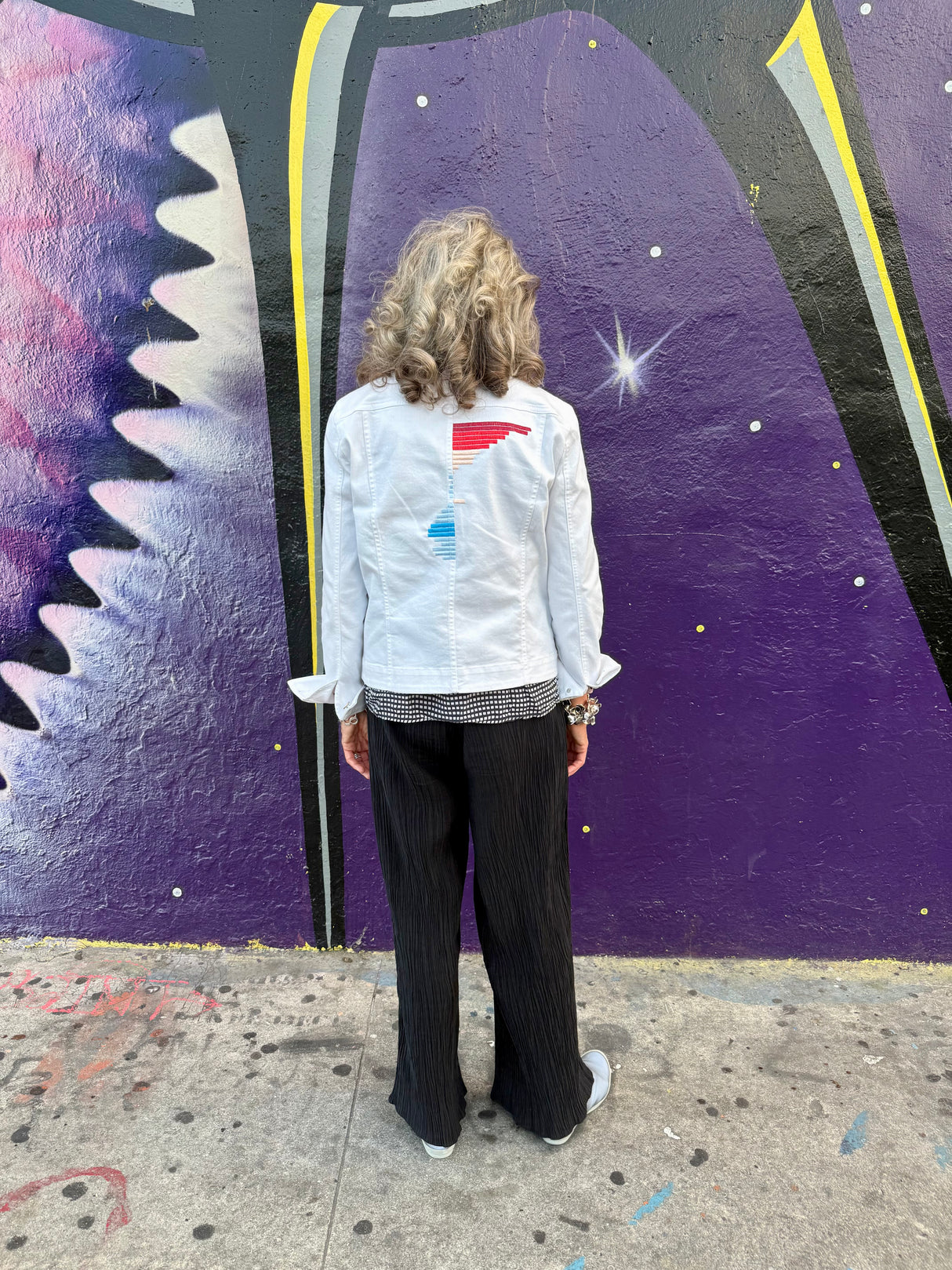 Barara wearing the rise custom jacket